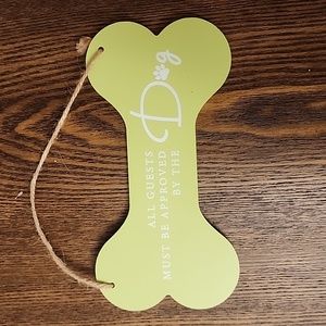 Dog sign:  all guests must be approved by the dog